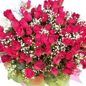 69 red Roses in a bouquet, close up